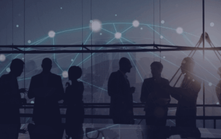 Blurred image of professionals at a global conference event.